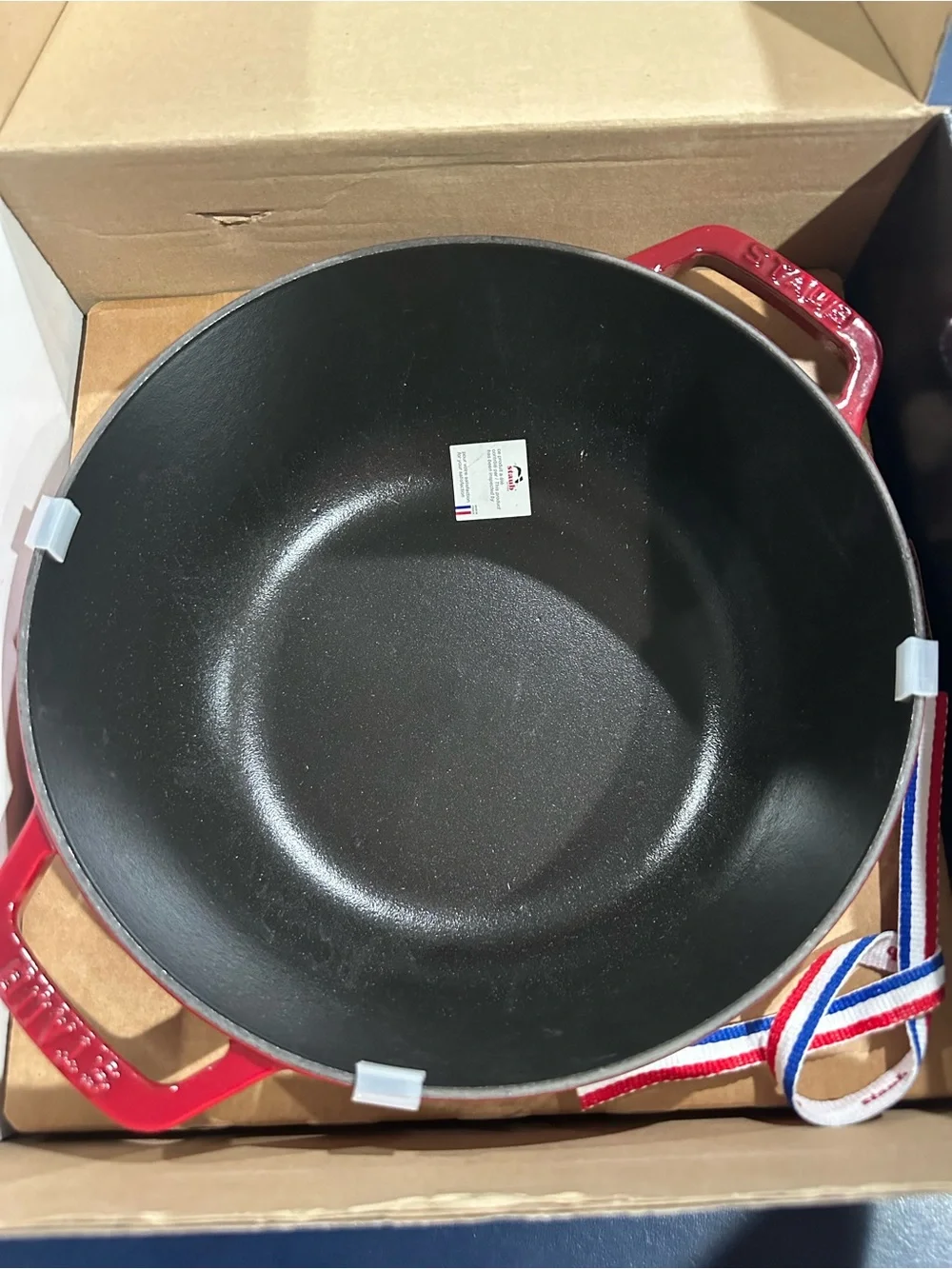 Staub Bright Red Enamel Cast Iron Cocotte with Rooster Motif
